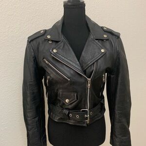 Heavy vintage leather moto jacket. Good used condition.